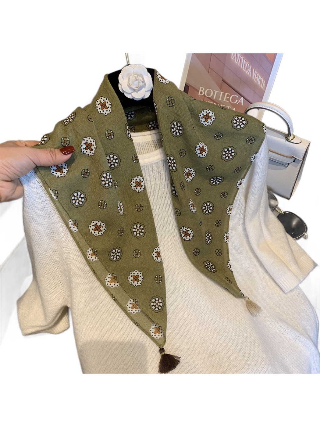 Army Green floral medallion scarf draped over a white sweater