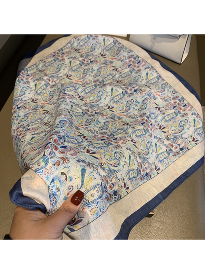 Close-up of the multicolor paisley pattern and fine woven-look texture
