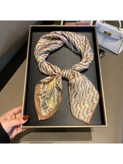 Multicolor square scarf tied to display the geometric striped side