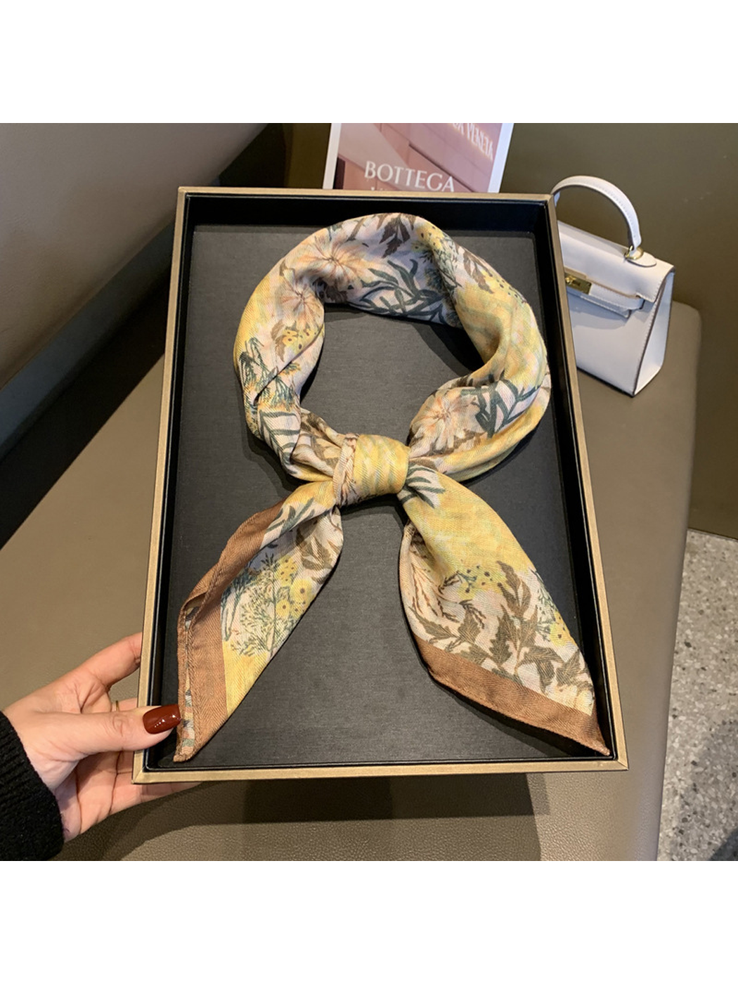Yellow botanical floral square scarf tied with two pointed ends