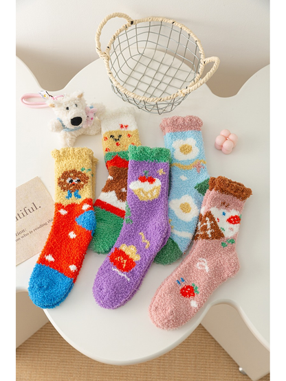 Five fuzzy crew sock styles with colorful food, character and daisy motifs
