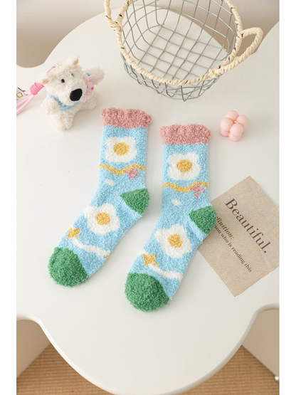 Daisies style fuzzy light blue crew socks with green toes