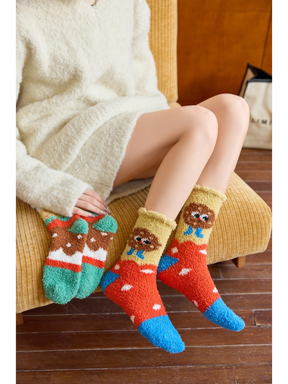 Cookie style fuzzy crew socks worn while Hamburger socks are held beside them