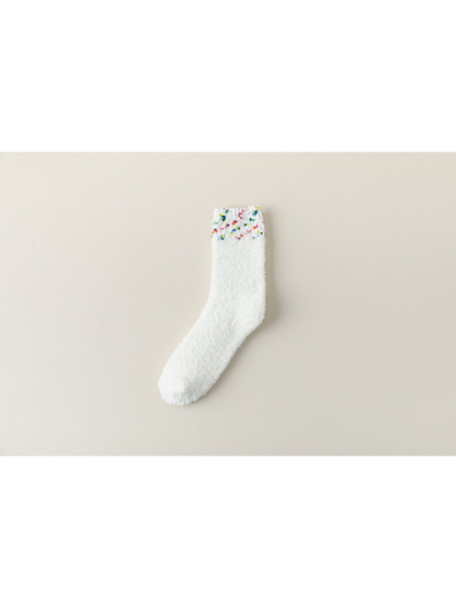 Multicolor fuzzy crew sock with a speckled cuff
