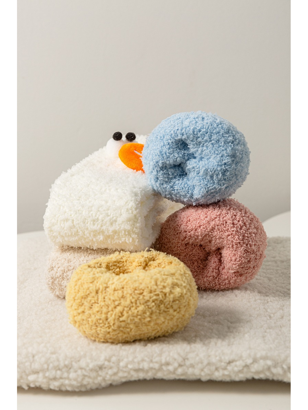 Close-up of the fuzzy texture and circular sock openings