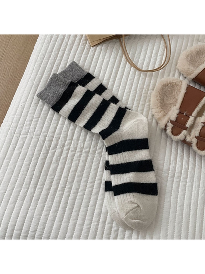 Black striped crew socks with gray cuffs