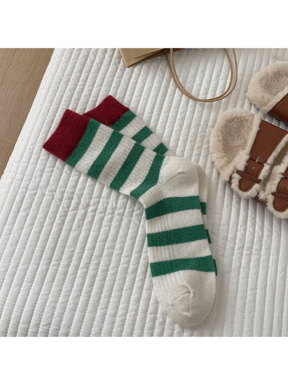 Green striped crew socks with burgundy cuffs