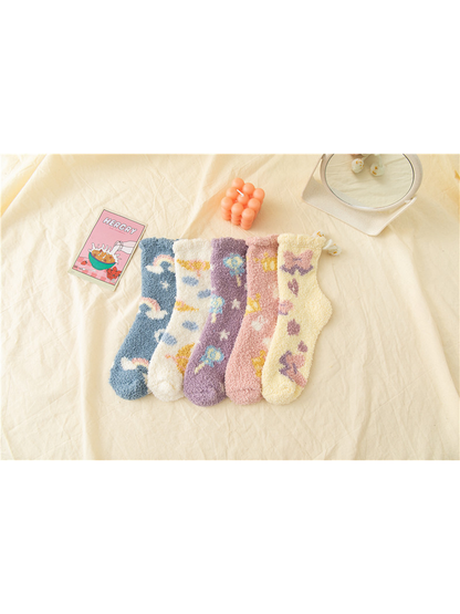 Five colorful fuzzy crew sock styles with pom-pom cuff ties