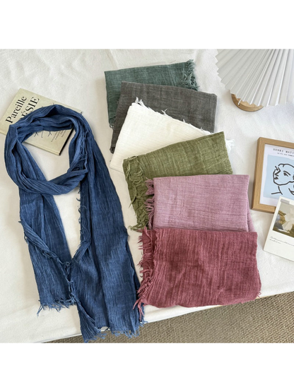 Blue scarf displayed with six folded color options