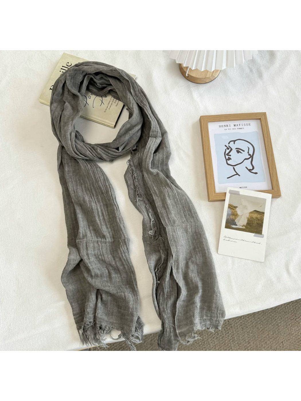 Gray crinkled scarf with fringed edges