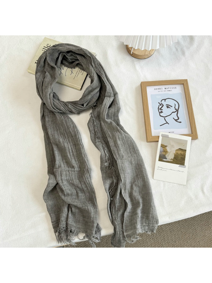Gray crinkled scarf with fringed edges