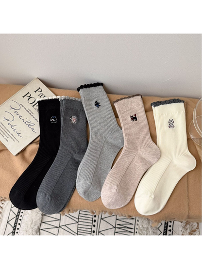 Five ribbed crew sock colors with scalloped cuffs and embroidered cat motifs