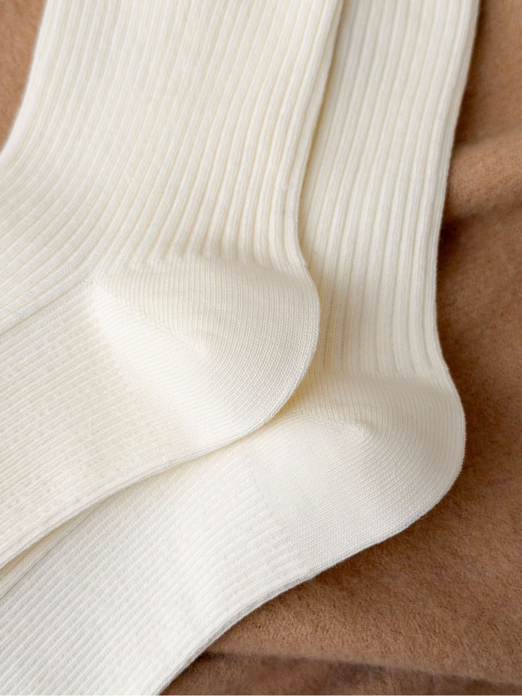 Close-up of Ivory sock ribbing and shaped heel