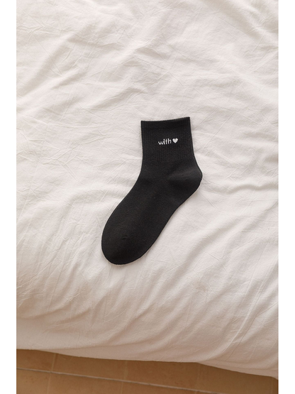 Black ankle sock with ribbed cuff and heart lettering