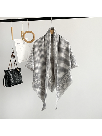 Gray houndstooth and paisley triangle scarf with fringed edges