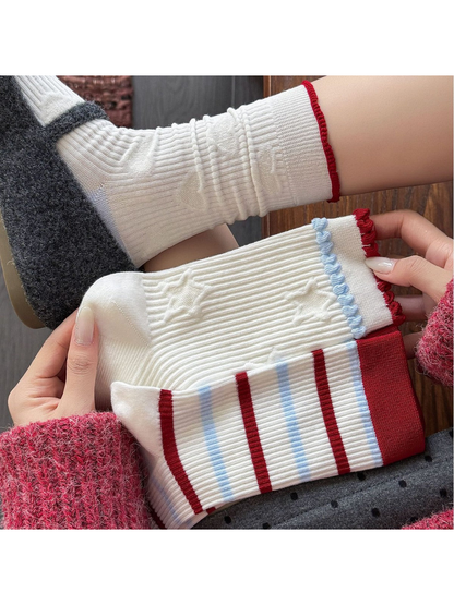 Striped, Stars and Hearts crew sock styles shown with ribbed and raised motifs