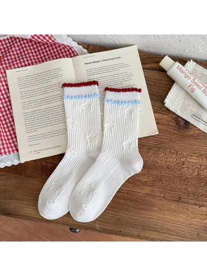 Stars style white ribbed crew socks with raised star motifs and red and light blue trim