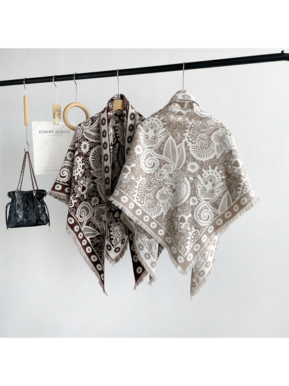 Brown and khaki paisley triangle scarves showing contrasting front and reverse patterns