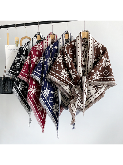 Black, burgundy, navy, and dark brown snowflake scarves displayed on hangers