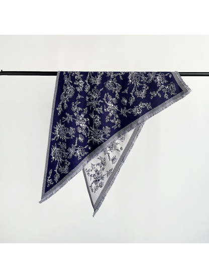 Navy floral triangle scarf with striped border and short fringe