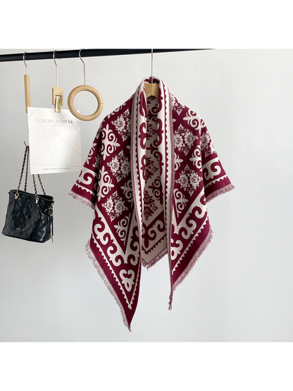 Burgundy patterned triangle scarf with short fringe, front view