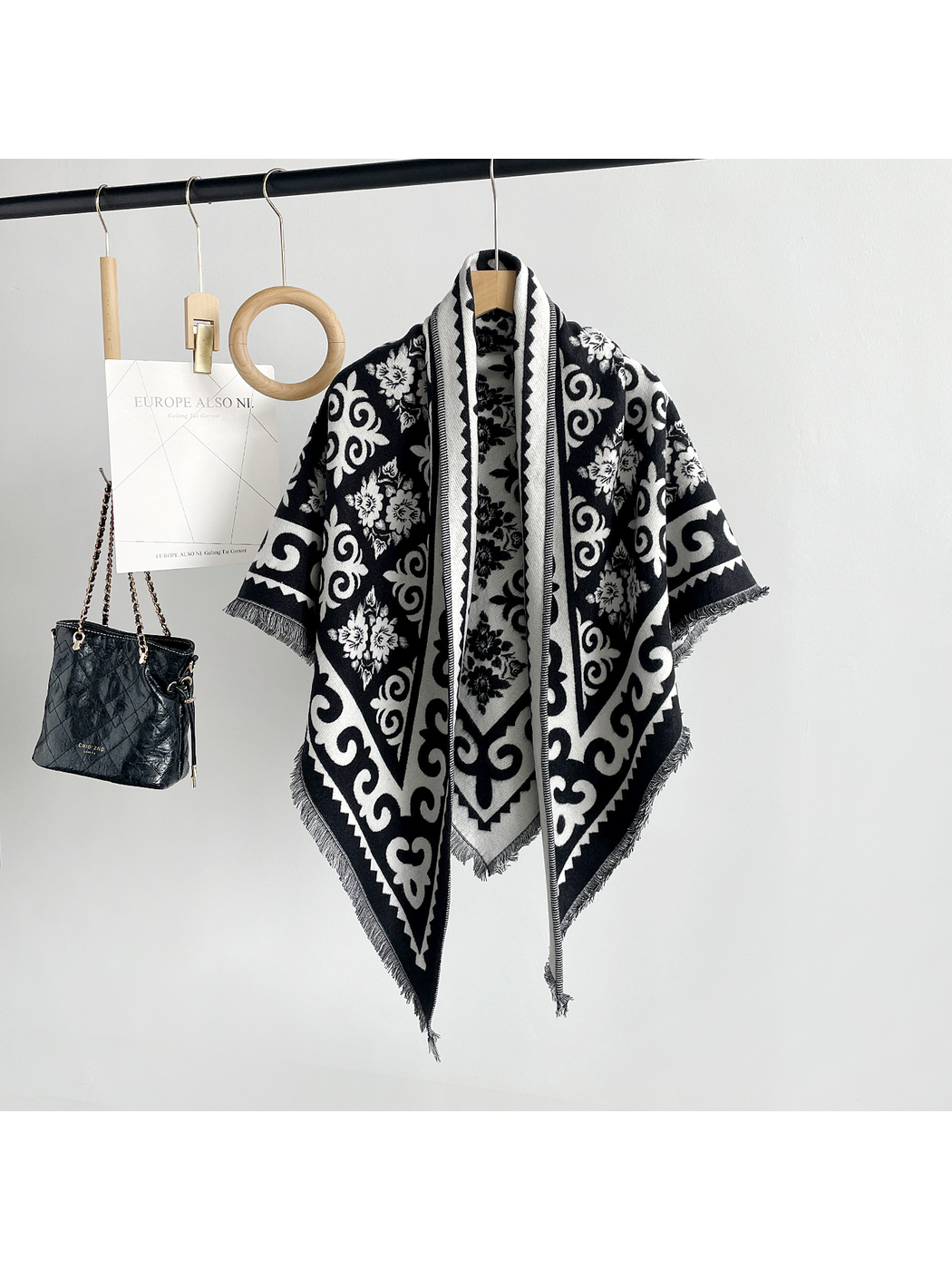 Black patterned triangle scarf with short fringe, front view