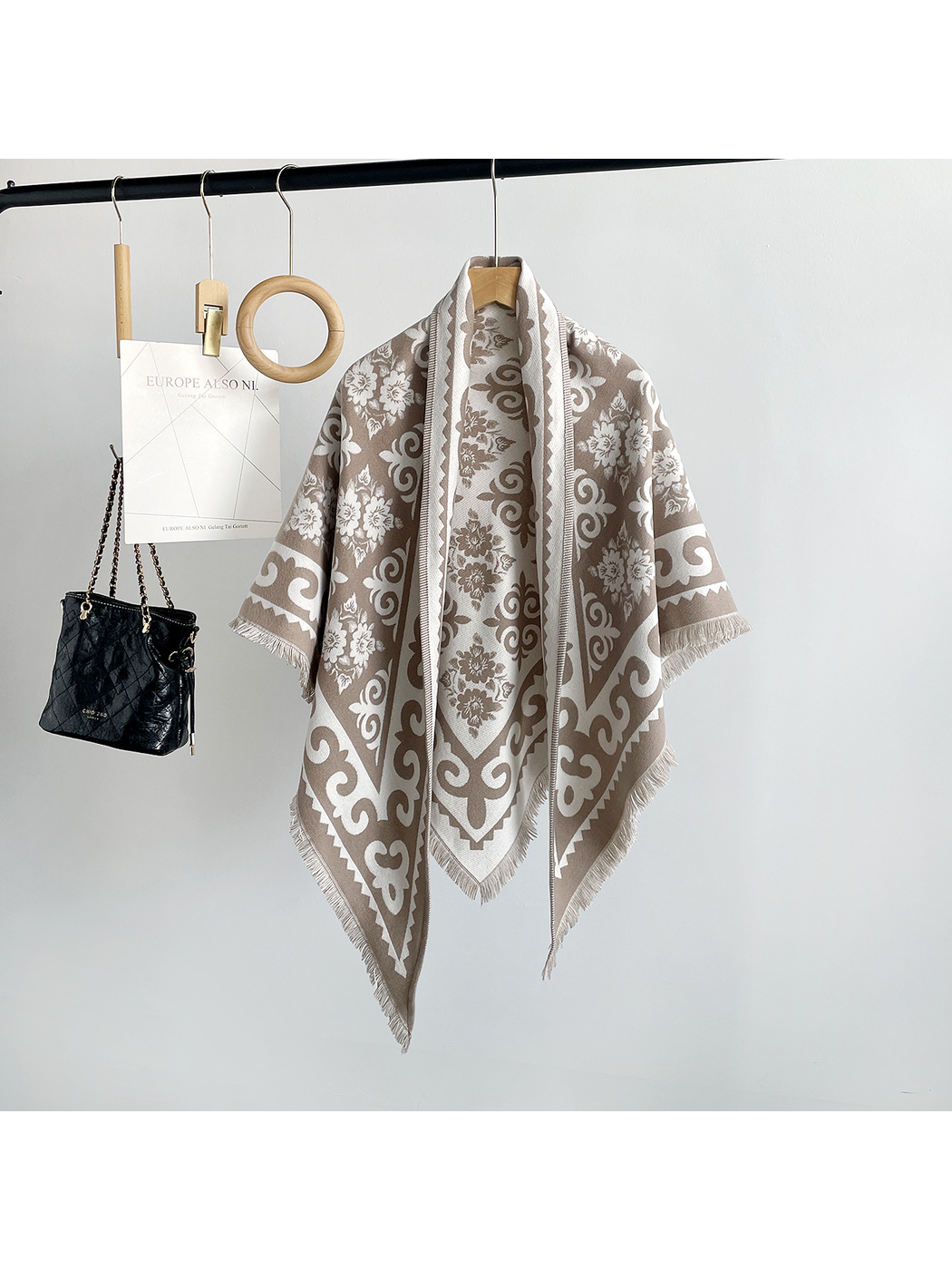 Greige patterned triangle scarf with short fringe, front view