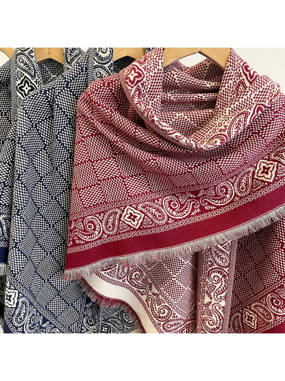 Close-up of Burgundy and Navy geometric scarves with paisley borders and short fringe