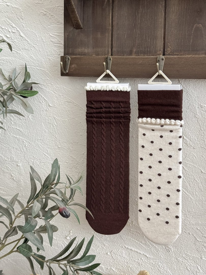 Cable and Polka Dots crew sock styles displayed side by side