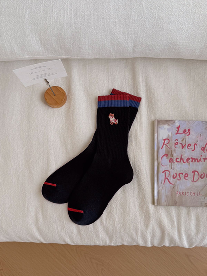 Striped Cat black crew socks with red and navy cuffs