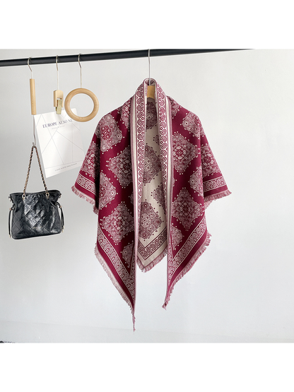 Burgundy medallion-pattern triangle scarf hanging in a full-length front view