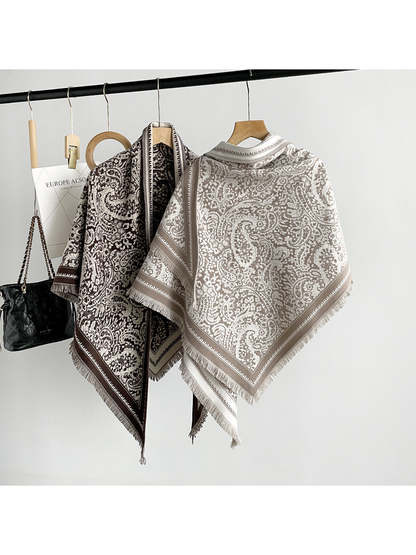Brown and khaki paisley triangle scarves showing their broad patterned panels