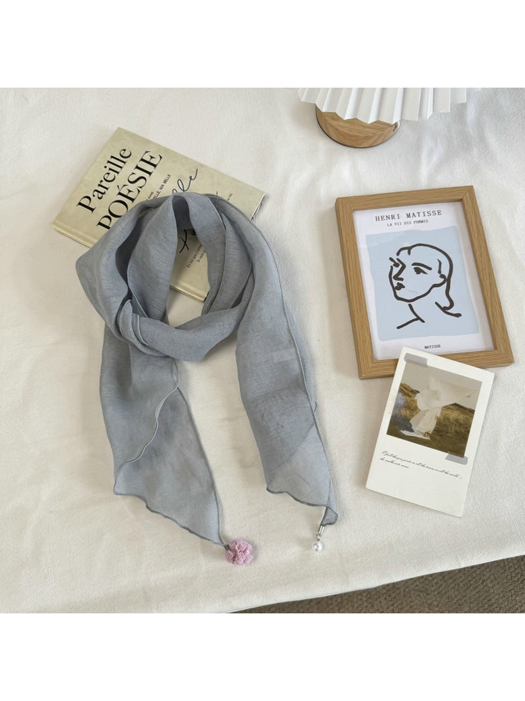 Blue Gray sheer scarf with wavy edges and pom-pom and bead end accents