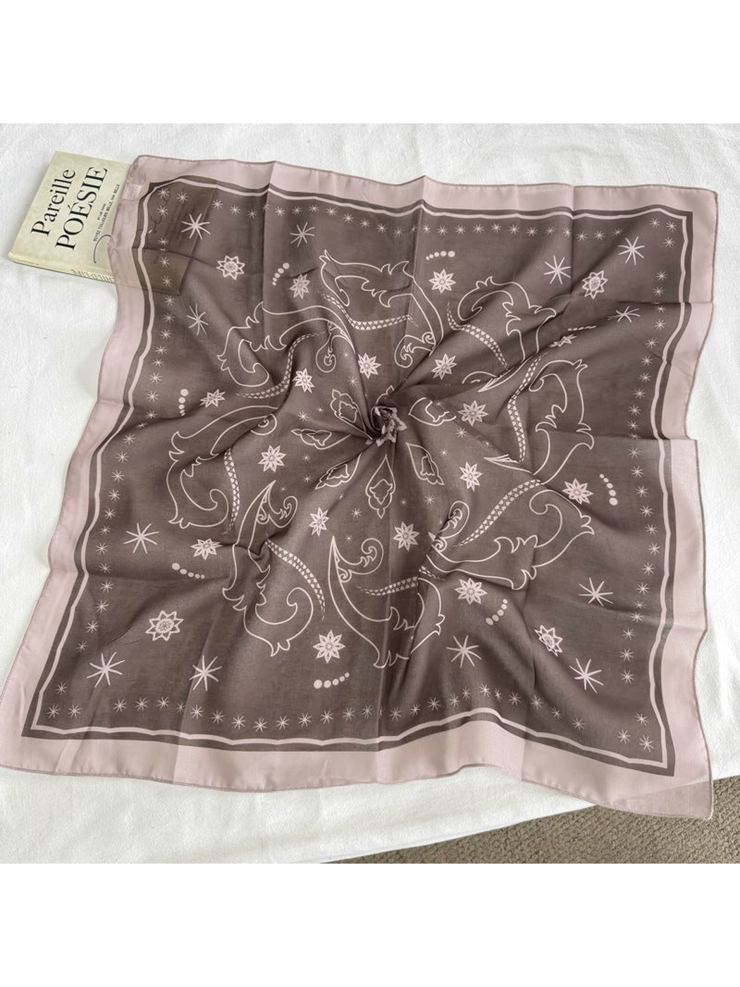 Dark Brown square scarf with star and scroll motifs displayed open