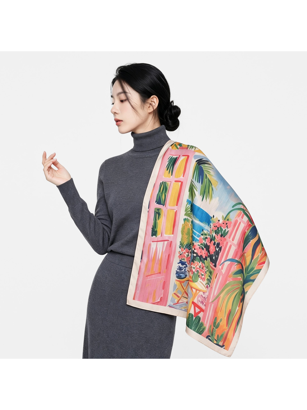 Multicolor square scarf draped over a dark gray outfit