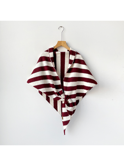 Burgundy and ivory striped triangle shawl tied on a wooden hanger