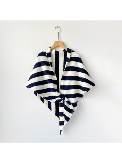 Navy and ivory striped triangle shawl tied on a wooden hanger