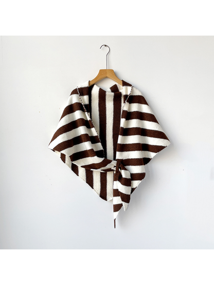 Brown and ivory striped triangle shawl tied on a wooden hanger