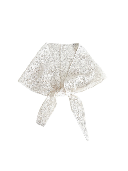 Ivory floral openwork triangle scarf tied at the front