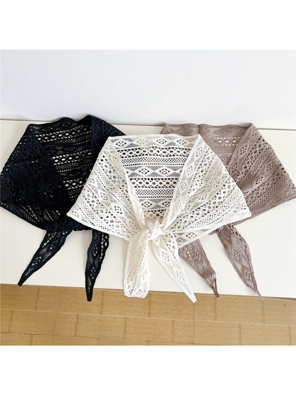 Black, Ivory and Light Coffee openwork triangle scarves displayed together