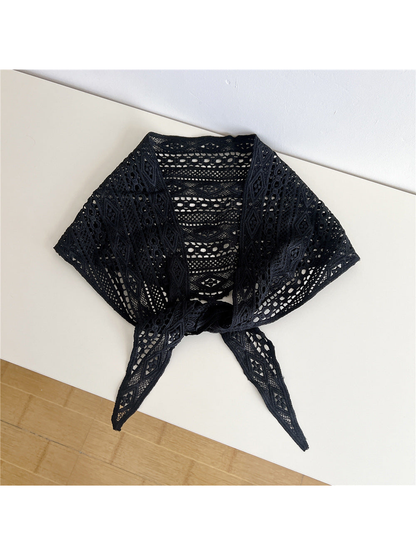 Black openwork triangle scarf tied at the front