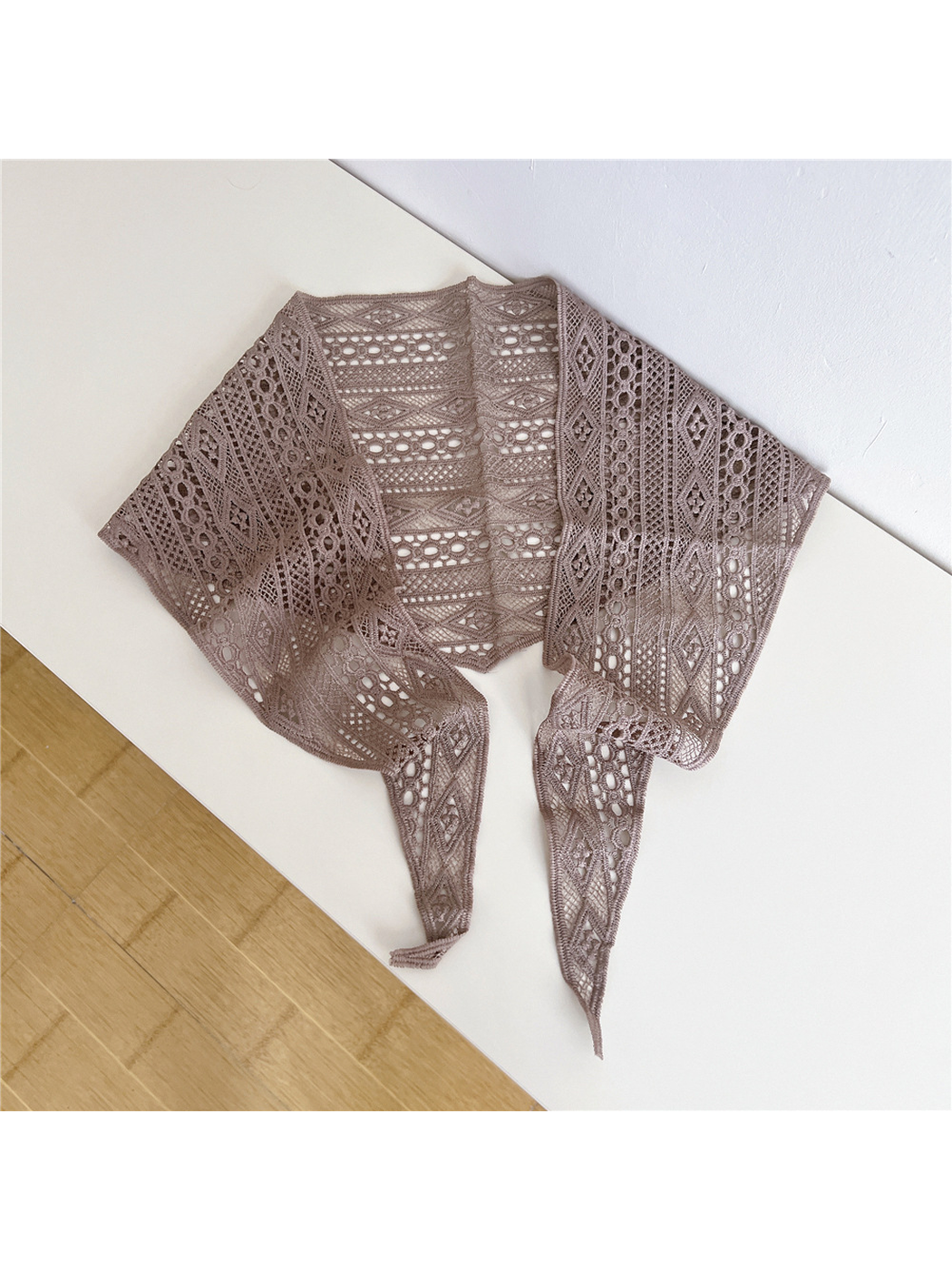 Light Coffee openwork triangle scarf laid open with pointed tie ends