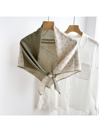 Army Green two-tone floral scarf tied on a hanger