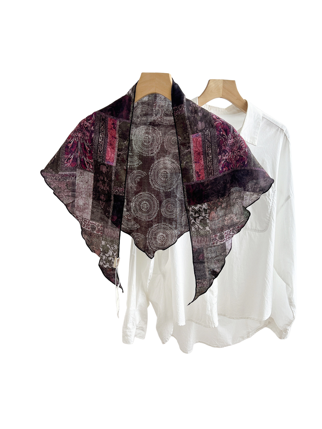 Radiant Magenta patchwork triangle scarf displayed over a white shirt