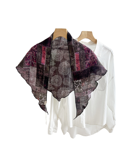 Radiant Magenta patchwork triangle scarf displayed over a white shirt