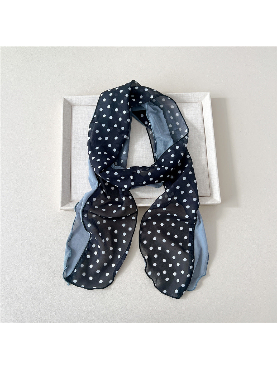 Black Dots scarf with white polka dots and a blue-gray side panel