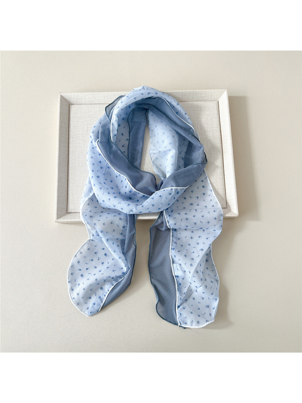 Blue Sprigs scarf with a small floral pattern and blue-gray side panel