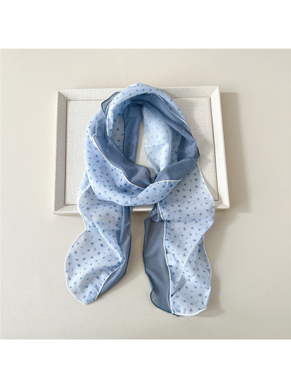 Blue Sprigs scarf with a small floral pattern and blue-gray side panel