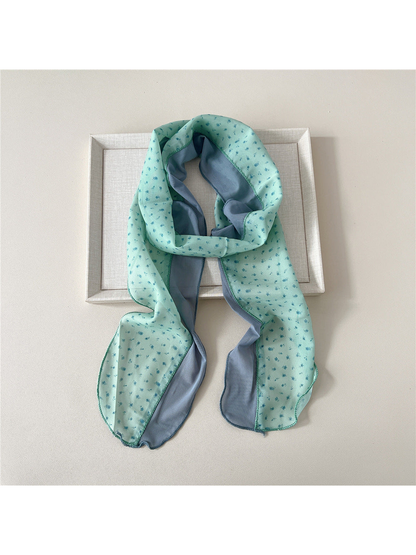 Mint Sprigs scarf with a small blue floral pattern and blue-gray side panel
