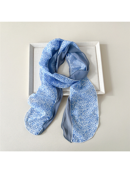 Blue Floral scarf with a dense floral print and blue-gray side panel